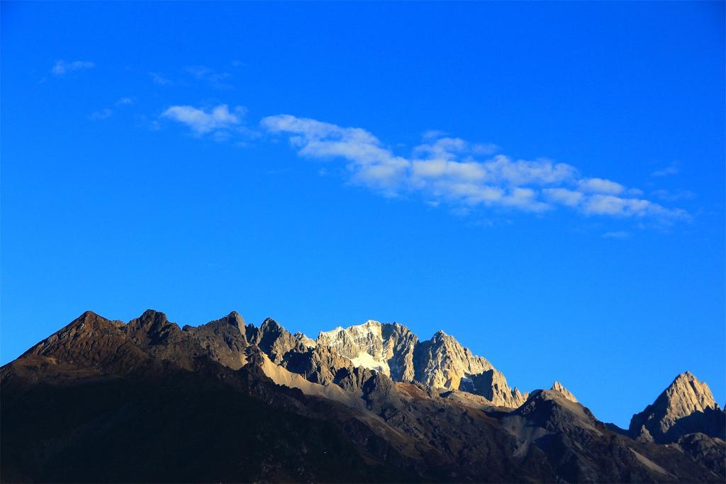 Lijiang Baisha Free Time Designed Hotel Exterior foto