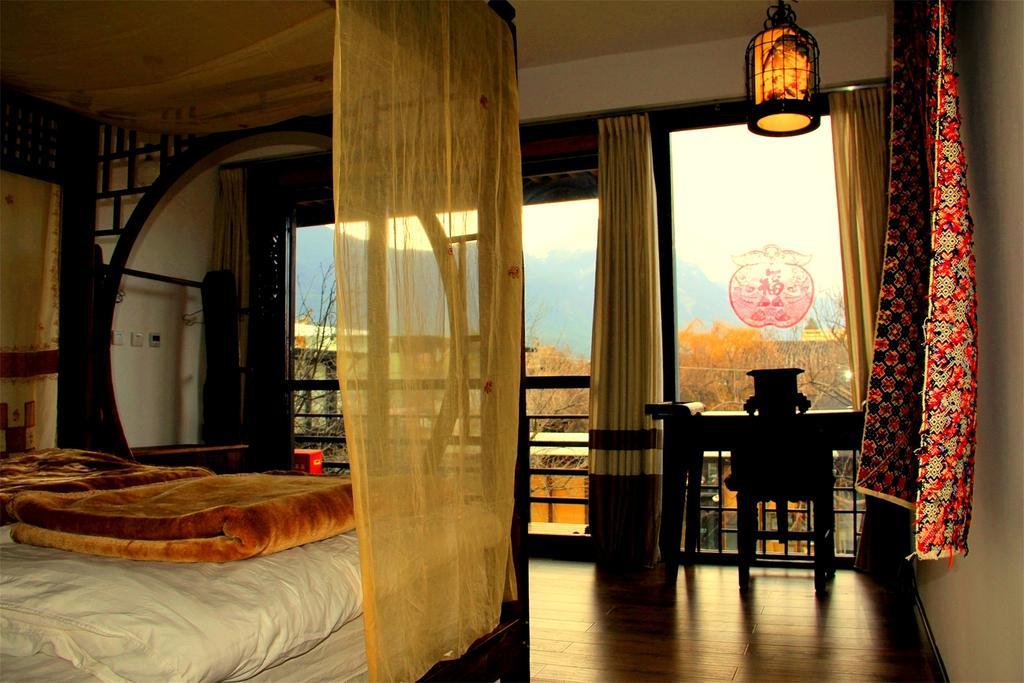 Lijiang Baisha Free Time Designed Hotel Exterior foto