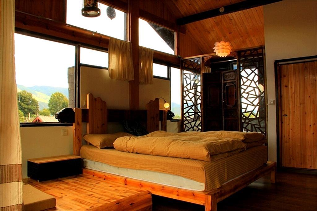 Lijiang Baisha Free Time Designed Hotel Exterior foto